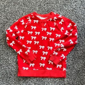 Red and white holiday bow sweatshirt